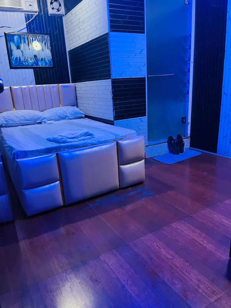 Private Therapy Bedroom Suite with Plush Headboard, Mood Lighting and En-Suite Shower